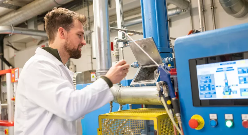 Laborant working at Bekina Compounds